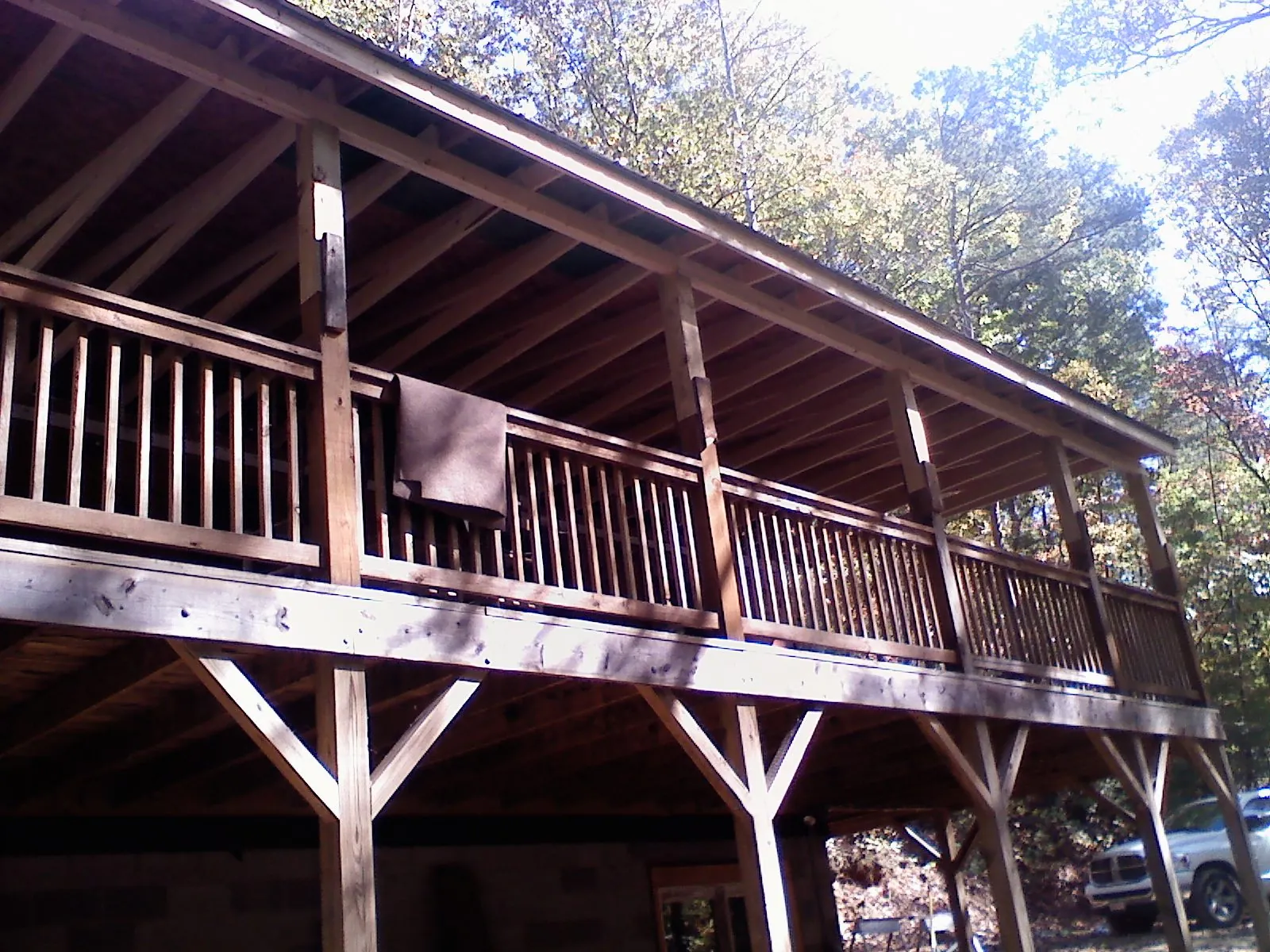 Timber framing under a new elevated porch and deck — Roof Leak Repair in Walpole by Roofing Brothers
